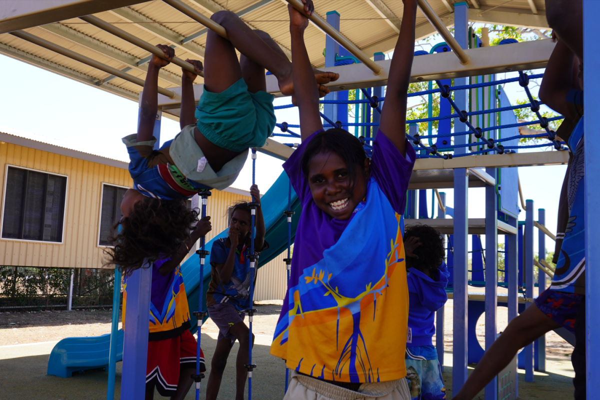 Students playing on equipment