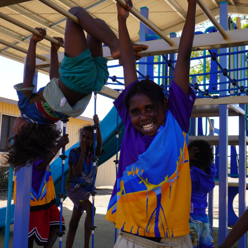 Students playing on equipment